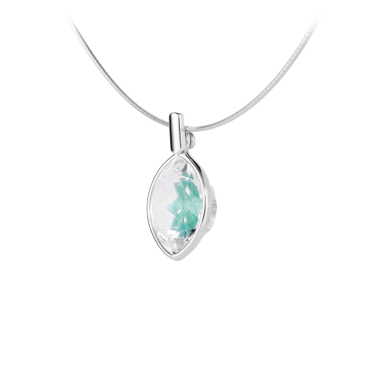Silver pendant with a green gemstone on a white background